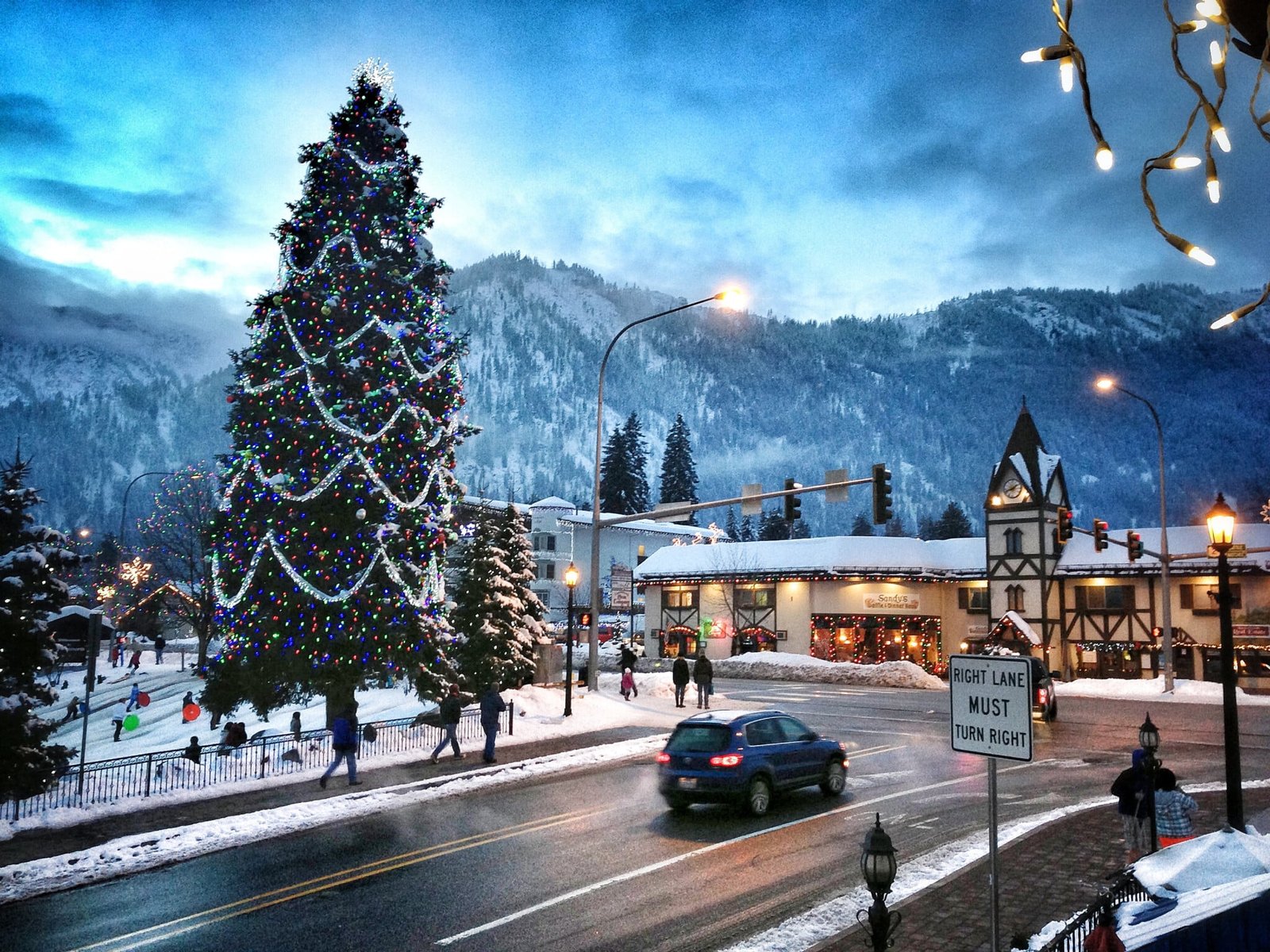 Snowy town square with Christmas tree