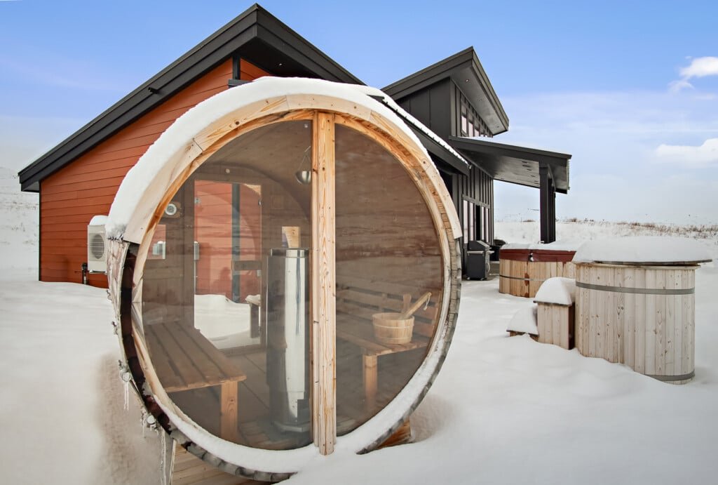 Modern sauna surrounded by snow